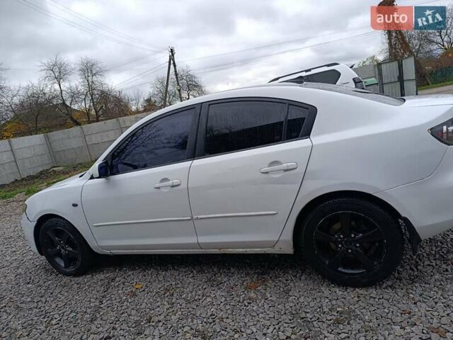 Білий Мазда 3, об'ємом двигуна 1.6 л та пробігом 235 тис. км за 5000 $, фото 2 на Automoto.ua