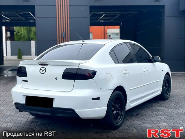 Білий Мазда 3, об'ємом двигуна 2 л та пробігом 182 тис. км за 4900 $, фото 3 на Automoto.ua