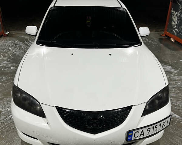 Белый Мазда 3, объемом двигателя 2 л и пробегом 295 тыс. км за 4500 $, фото 10 на Automoto.ua