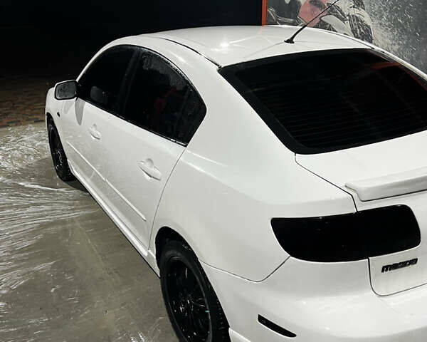 Белый Мазда 3, объемом двигателя 2 л и пробегом 295 тыс. км за 4500 $, фото 13 на Automoto.ua
