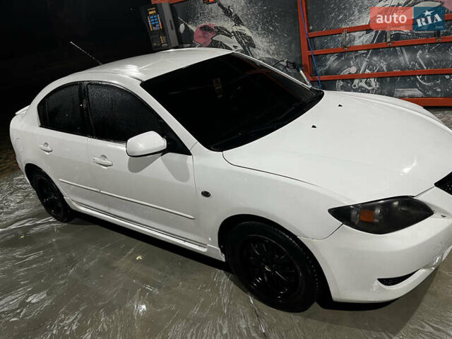 Белый Мазда 3, объемом двигателя 2 л и пробегом 295 тыс. км за 4500 $, фото 9 на Automoto.ua