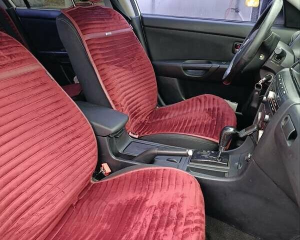 Білий Мазда 3, об'ємом двигуна 1.6 л та пробігом 235 тис. км за 5000 $, фото 7 на Automoto.ua