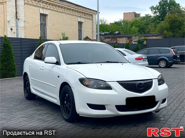 Білий Мазда 3, об'ємом двигуна 2 л та пробігом 182 тис. км за 4900 $, фото 2 на Automoto.ua