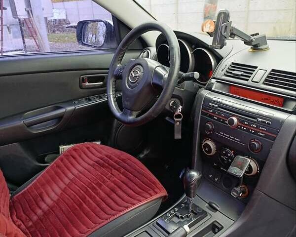 Білий Мазда 3, об'ємом двигуна 1.6 л та пробігом 235 тис. км за 5000 $, фото 5 на Automoto.ua