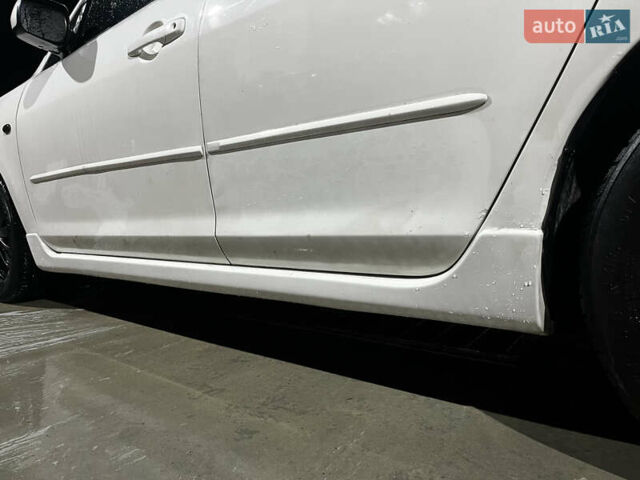 Белый Мазда 3, объемом двигателя 2 л и пробегом 295 тыс. км за 4500 $, фото 15 на Automoto.ua