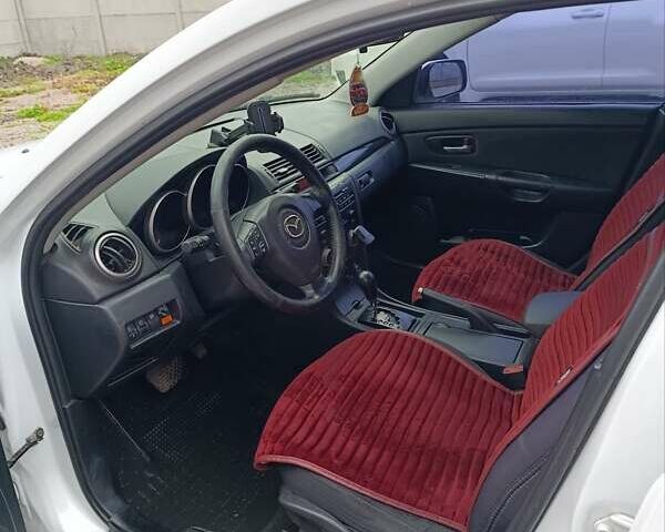 Білий Мазда 3, об'ємом двигуна 1.6 л та пробігом 235 тис. км за 5000 $, фото 8 на Automoto.ua