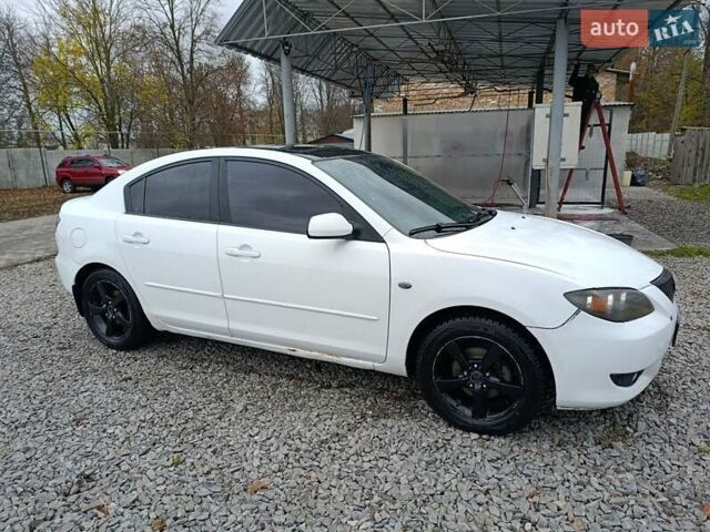 Білий Мазда 3, об'ємом двигуна 1.6 л та пробігом 235 тис. км за 5000 $, фото 3 на Automoto.ua