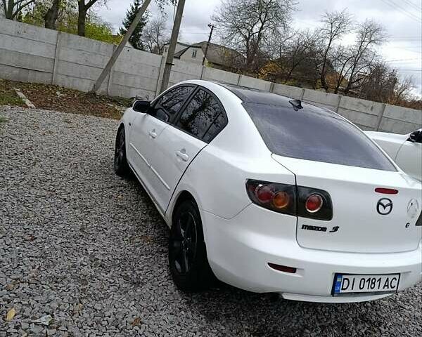 Білий Мазда 3, об'ємом двигуна 1.6 л та пробігом 235 тис. км за 5000 $, фото 1 на Automoto.ua