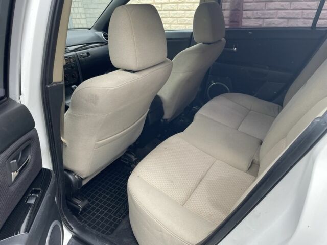 Білий Мазда 3, об'ємом двигуна 2 л та пробігом 181 тис. км за 4200 $, фото 5 на Automoto.ua