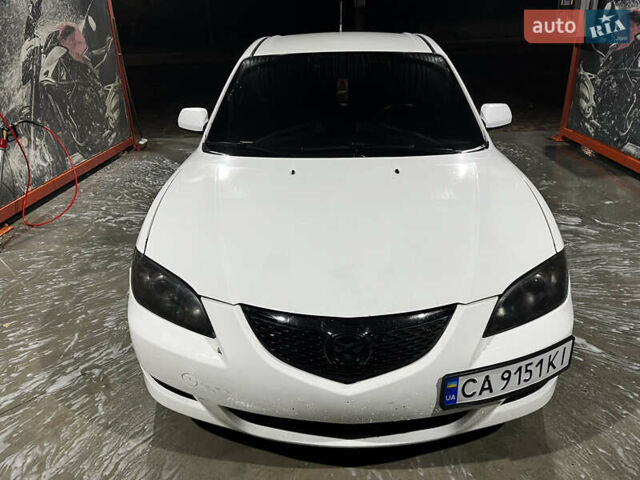 Белый Мазда 3, объемом двигателя 2 л и пробегом 295 тыс. км за 4500 $, фото 7 на Automoto.ua