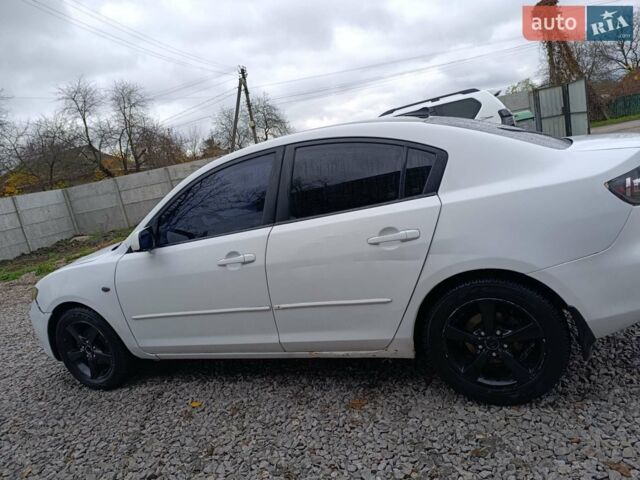 Білий Мазда 3, об'ємом двигуна 1.6 л та пробігом 235 тис. км за 4500 $, фото 2 на Automoto.ua