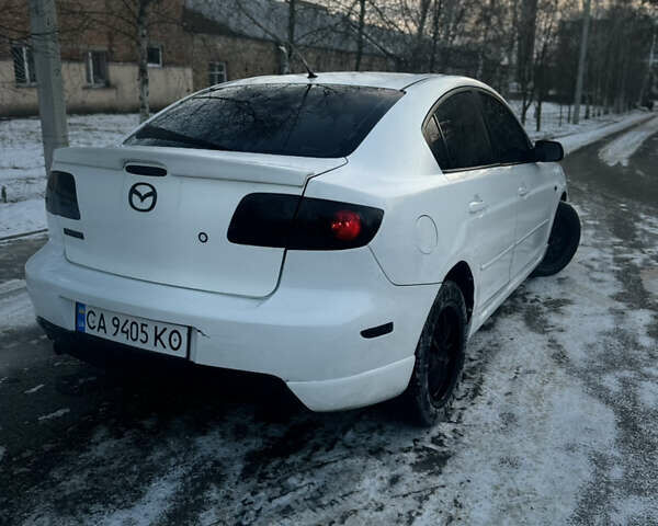 Білий Мазда 3, об'ємом двигуна 2 л та пробігом 270 тис. км за 4200 $, фото 3 на Automoto.ua