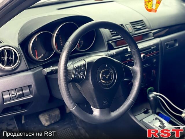 Білий Мазда 3, об'ємом двигуна 2 л та пробігом 182 тис. км за 4900 $, фото 7 на Automoto.ua