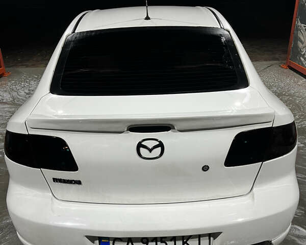 Белый Мазда 3, объемом двигателя 2 л и пробегом 295 тыс. км за 4500 $, фото 12 на Automoto.ua