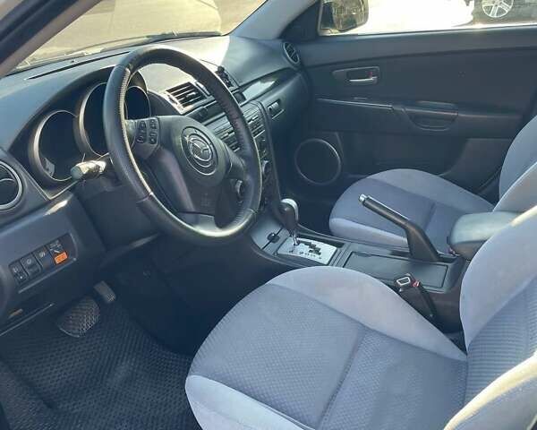 Білий Мазда 3, об'ємом двигуна 1.6 л та пробігом 190 тис. км за 6100 $, фото 7 на Automoto.ua