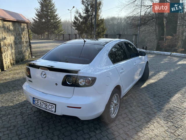 Білий Мазда 3, об'ємом двигуна 1.6 л та пробігом 185 тис. км за 5800 $, фото 9 на Automoto.ua