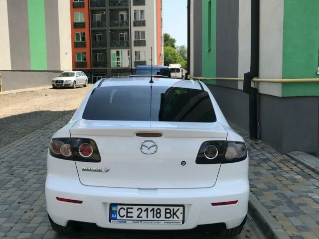 Белый Мазда 3, объемом двигателя 1 л и пробегом 133 тыс. км за 7000 $, фото 4 на Automoto.ua