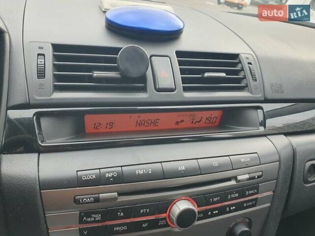 Белый Мазда 3, объемом двигателя 1.6 л и пробегом 120 тыс. км за 5999 $, фото 33 на Automoto.ua