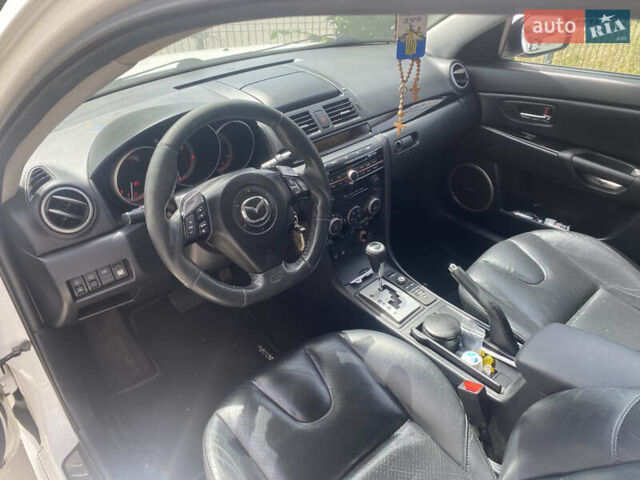 Белый Мазда 3, объемом двигателя 2 л и пробегом 140 тыс. км за 7500 $, фото 4 на Automoto.ua