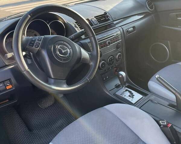 Білий Мазда 3, об'ємом двигуна 1.6 л та пробігом 190 тис. км за 6100 $, фото 6 на Automoto.ua