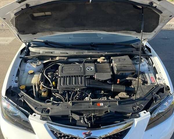 Білий Мазда 3, об'ємом двигуна 1.6 л та пробігом 190 тис. км за 6100 $, фото 16 на Automoto.ua