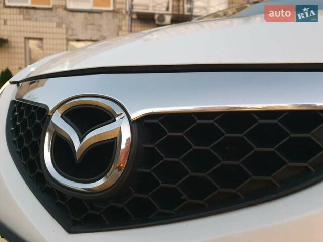 Білий Мазда 3, об'ємом двигуна 1.6 л та пробігом 120 тис. км за 5700 $, фото 10 на Automoto.ua