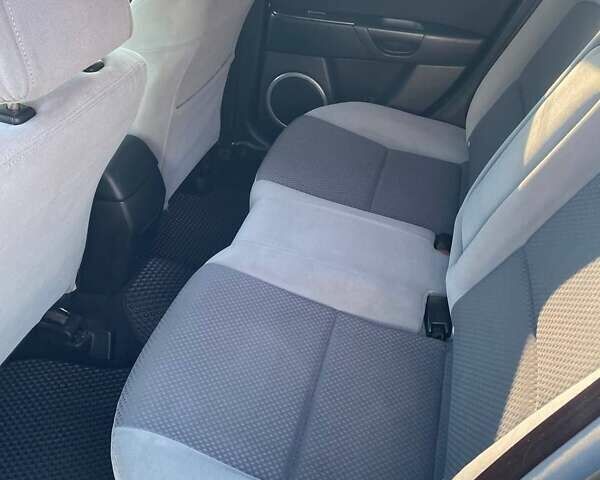 Білий Мазда 3, об'ємом двигуна 1.6 л та пробігом 190 тис. км за 6100 $, фото 12 на Automoto.ua