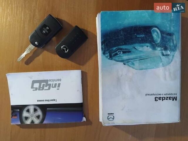 Білий Мазда 3, об'ємом двигуна 1.6 л та пробігом 190 тис. км за 6100 $, фото 17 на Automoto.ua