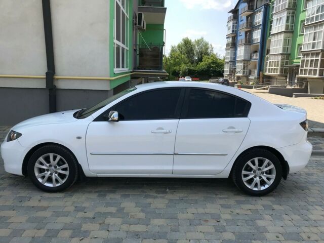 Белый Мазда 3, объемом двигателя 1 л и пробегом 133 тыс. км за 7000 $, фото 3 на Automoto.ua