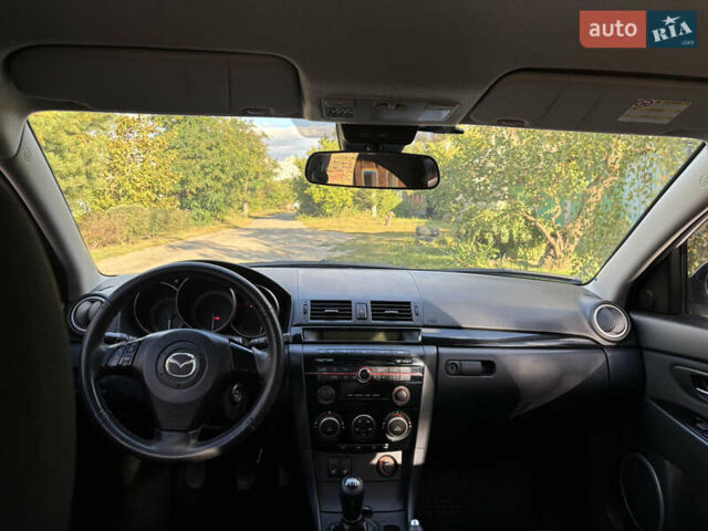 Белый Мазда 3, объемом двигателя 2 л и пробегом 180 тыс. км за 6200 $, фото 9 на Automoto.ua