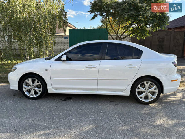 Белый Мазда 3, объемом двигателя 2 л и пробегом 180 тыс. км за 6200 $, фото 4 на Automoto.ua