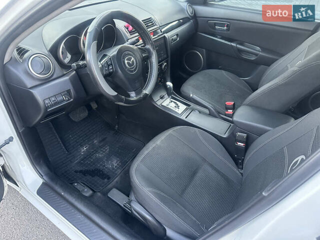 Белый Мазда 3, объемом двигателя 1.6 л и пробегом 165 тыс. км за 7500 $, фото 23 на Automoto.ua