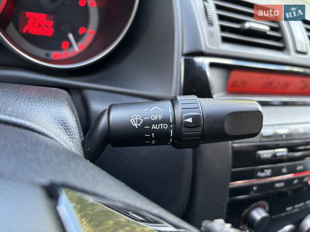 Белый Мазда 3, объемом двигателя 2 л и пробегом 180 тыс. км за 6200 $, фото 14 на Automoto.ua