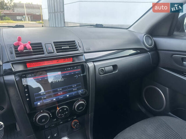 Белый Мазда 3, объемом двигателя 1.6 л и пробегом 165 тыс. км за 7500 $, фото 28 на Automoto.ua