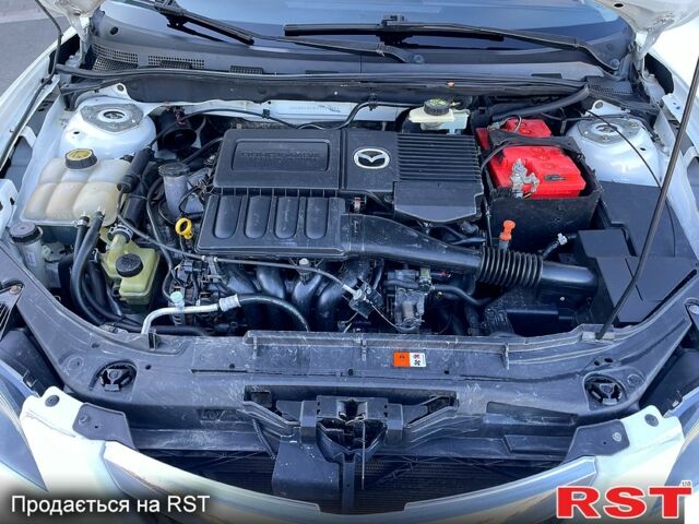 Белый Мазда 3, объемом двигателя 1.6 л и пробегом 215 тыс. км за 5650 $, фото 9 на Automoto.ua