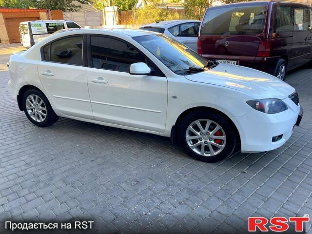 Белый Мазда 3, объемом двигателя 1.6 л и пробегом 215 тыс. км за 5650 $, фото 5 на Automoto.ua