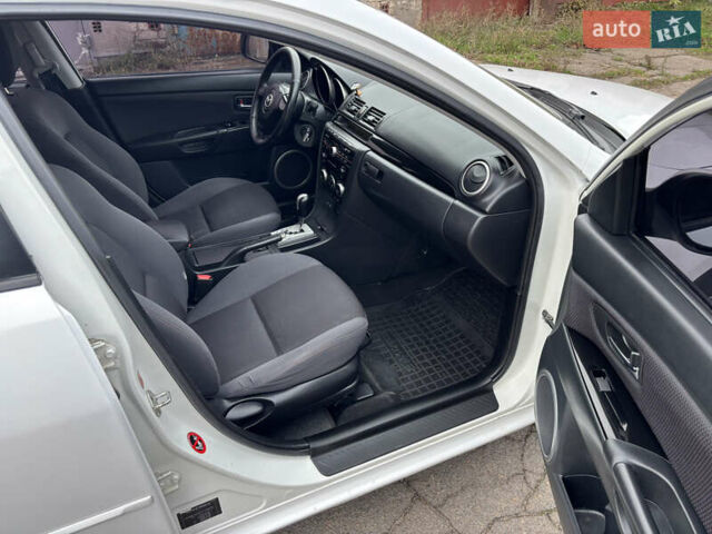 Білий Мазда 3, об'ємом двигуна 1.6 л та пробігом 156 тис. км за 6000 $, фото 15 на Automoto.ua