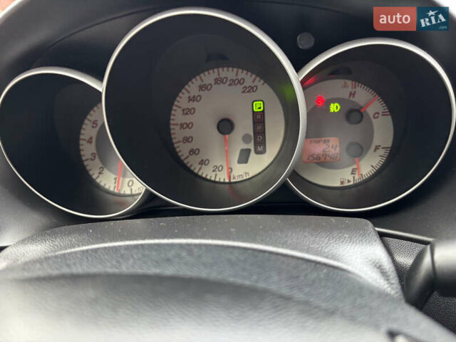 Білий Мазда 3, об'ємом двигуна 1.6 л та пробігом 156 тис. км за 6000 $, фото 12 на Automoto.ua