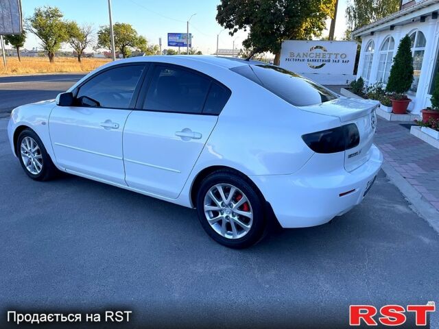 Белый Мазда 3, объемом двигателя 1.6 л и пробегом 215 тыс. км за 5650 $, фото 2 на Automoto.ua