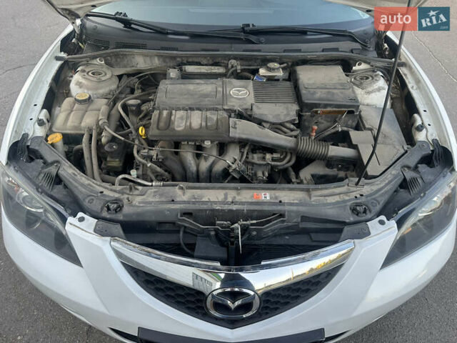 Белый Мазда 3, объемом двигателя 1.6 л и пробегом 165 тыс. км за 7500 $, фото 22 на Automoto.ua