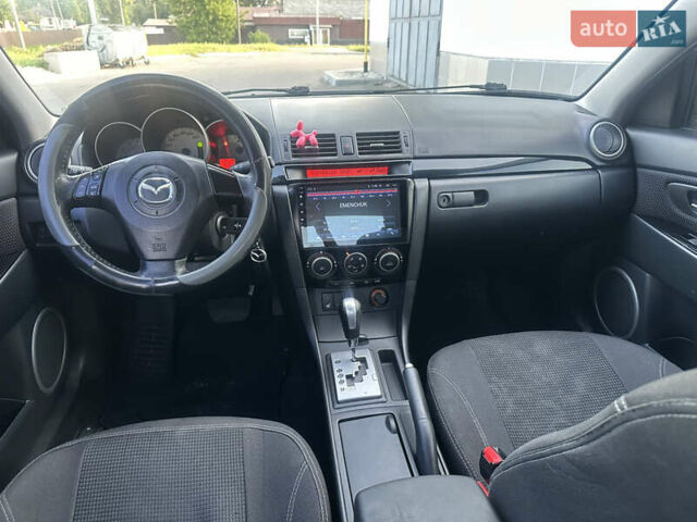 Белый Мазда 3, объемом двигателя 1.6 л и пробегом 165 тыс. км за 7500 $, фото 35 на Automoto.ua