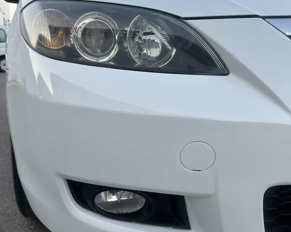 Белый Мазда 3, объемом двигателя 1.6 л и пробегом 165 тыс. км за 7500 $, фото 12 на Automoto.ua