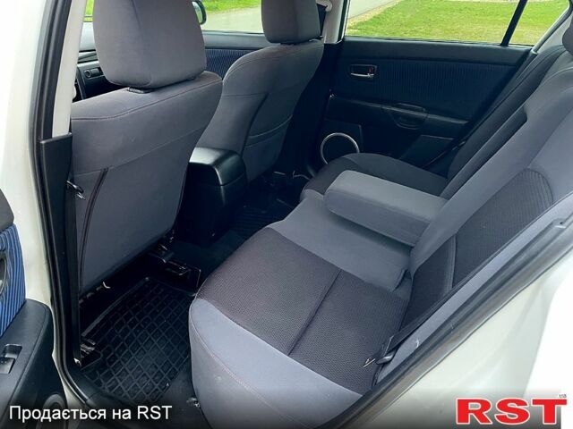 Белый Мазда 3, объемом двигателя 1.6 л и пробегом 163 тыс. км за 5350 $, фото 13 на Automoto.ua