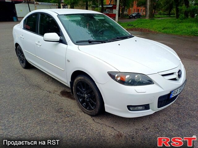 Білий Мазда 3, об'ємом двигуна 1.6 л та пробігом 190 тис. км за 6500 $, фото 4 на Automoto.ua