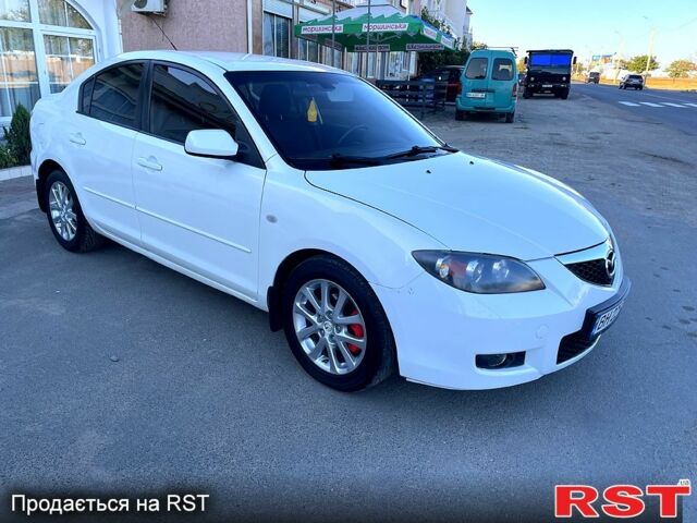 Белый Мазда 3, объемом двигателя 1.6 л и пробегом 215 тыс. км за 5650 $, фото 1 на Automoto.ua