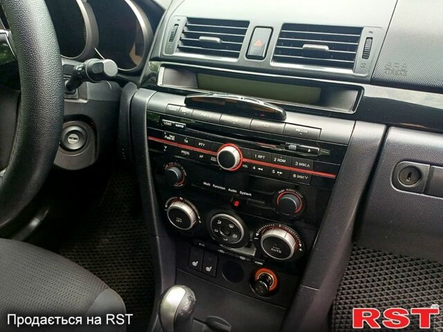 Білий Мазда 3, об'ємом двигуна 1.6 л та пробігом 190 тис. км за 6500 $, фото 9 на Automoto.ua