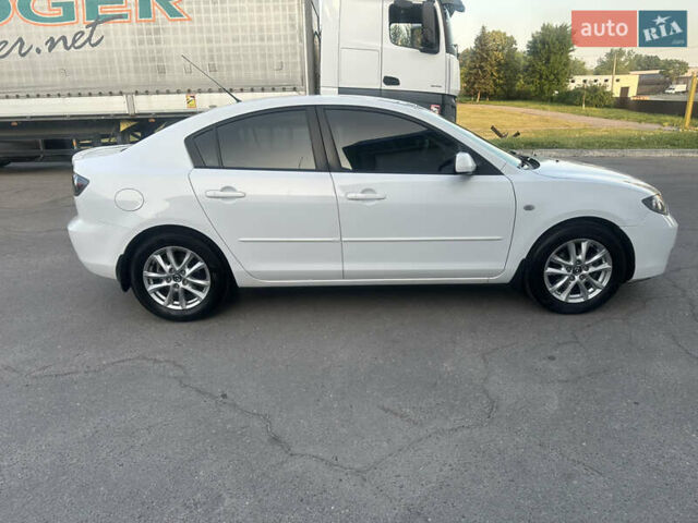 Белый Мазда 3, объемом двигателя 1.6 л и пробегом 165 тыс. км за 7500 $, фото 3 на Automoto.ua