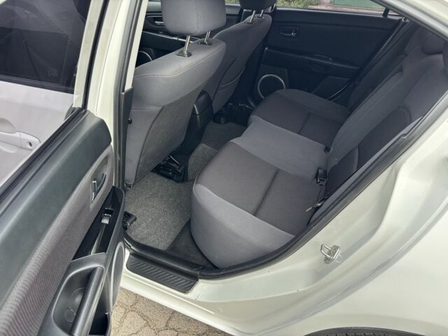 Білий Мазда 3, об'ємом двигуна 1.6 л та пробігом 156 тис. км за 6000 $, фото 13 на Automoto.ua