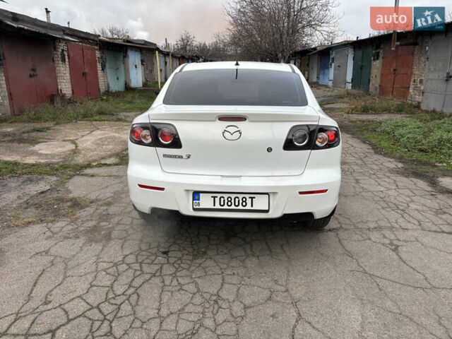 Білий Мазда 3, об'ємом двигуна 1.6 л та пробігом 156 тис. км за 6000 $, фото 5 на Automoto.ua