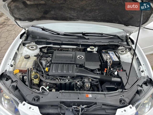Білий Мазда 3, об'ємом двигуна 1.6 л та пробігом 156 тис. км за 6000 $, фото 16 на Automoto.ua